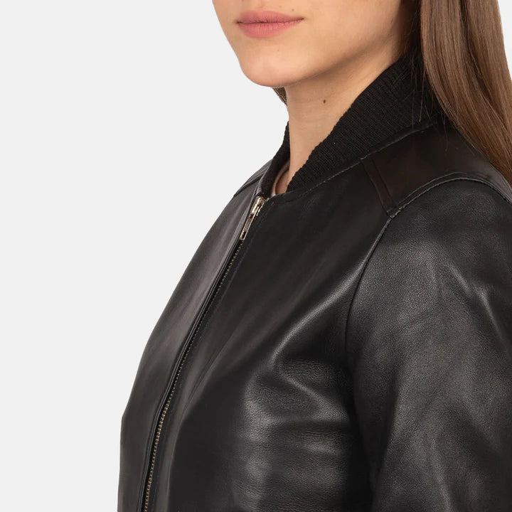 "Bliss Black Leather Bomber Jacket by MordenJacket – a contemporary black leather bomber featuring a smooth finish, ribbed cuffs and hem, and a relaxed yet structured fit for a perfect balance of comfort and cool."
left side pose